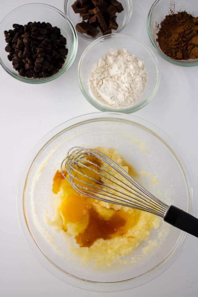 mixing eggs into sugar and butter mixture