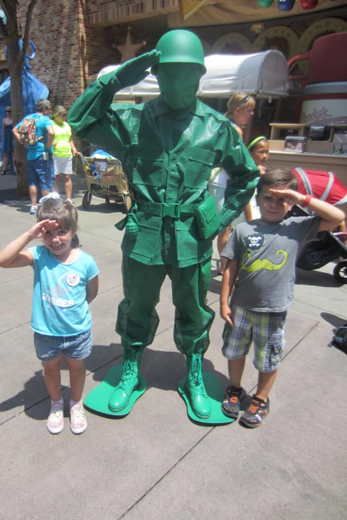 Character photos at Disney. Boy and girl with solder