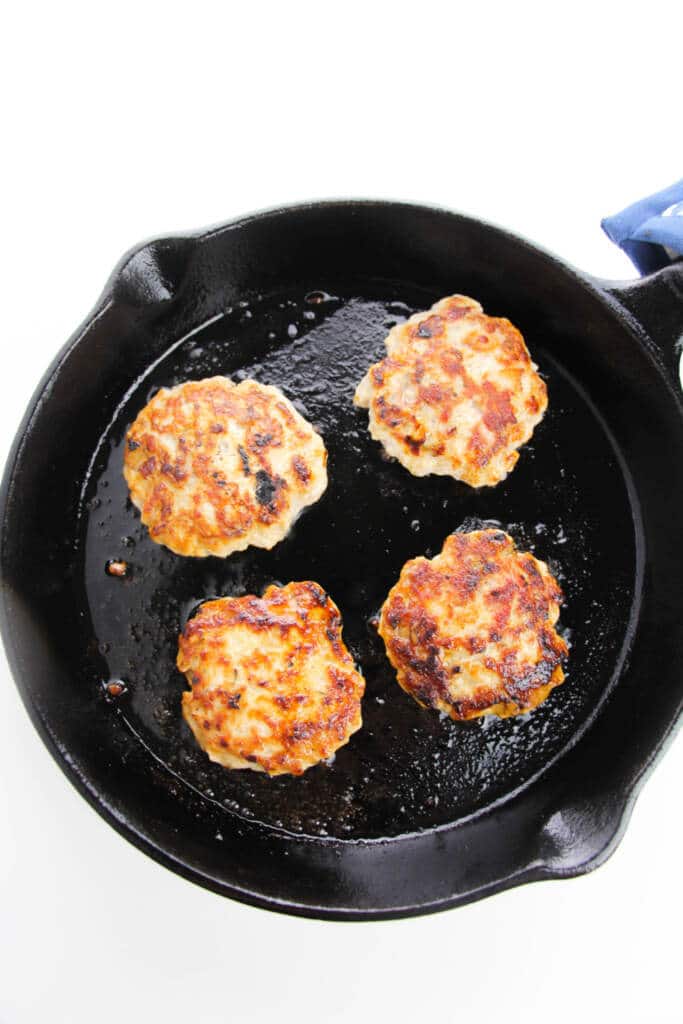 Cooking breakfast sausage in cast iron pan