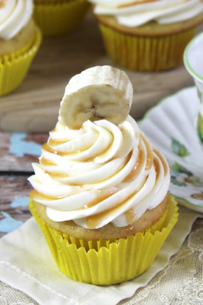 banana cupcakes on display on wooden background