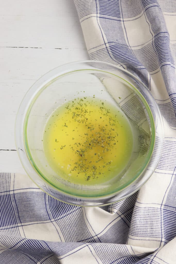 butter garlic sauce in glass bowl