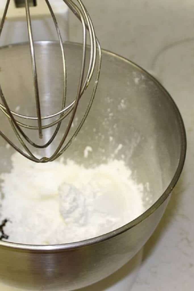 mixing dry ingredients together in large bowl