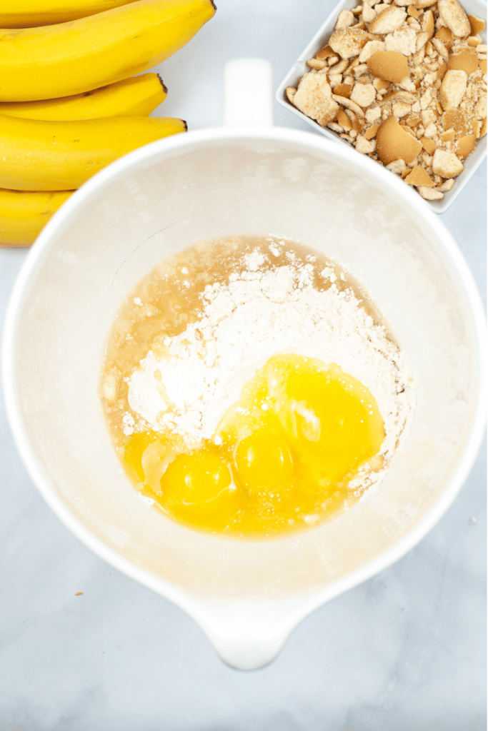 mixing ingredients together for poke cake