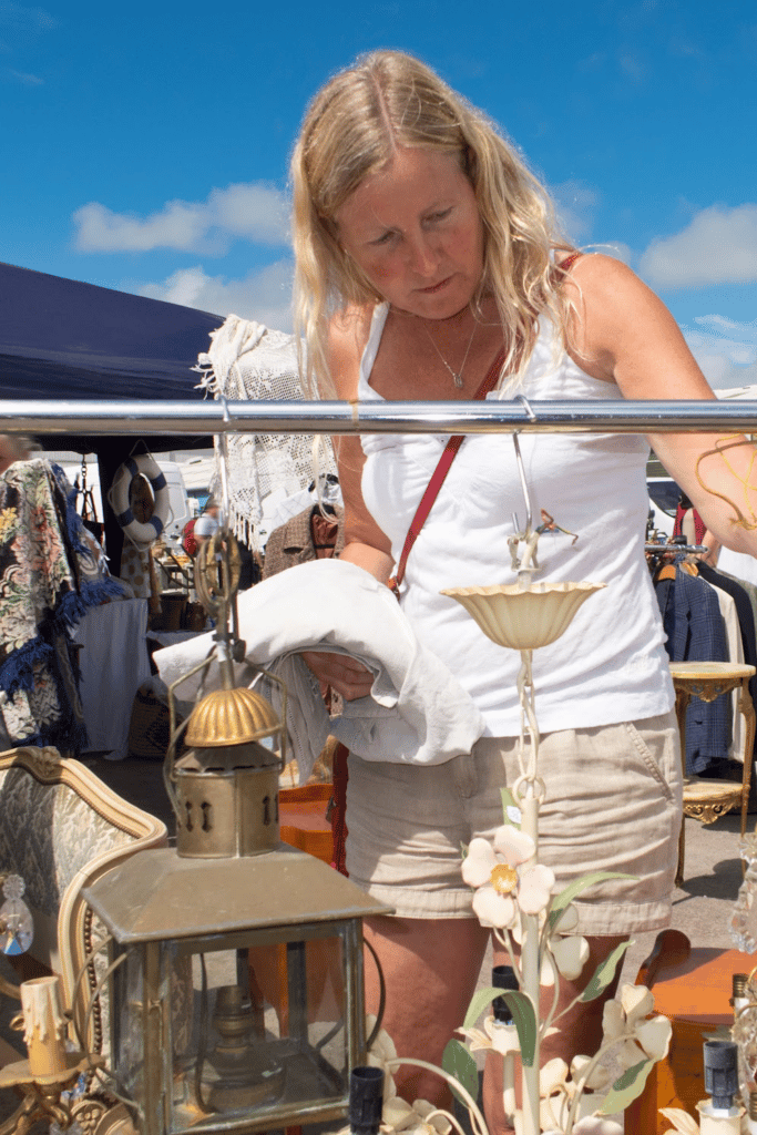 woman shopping at garage sale