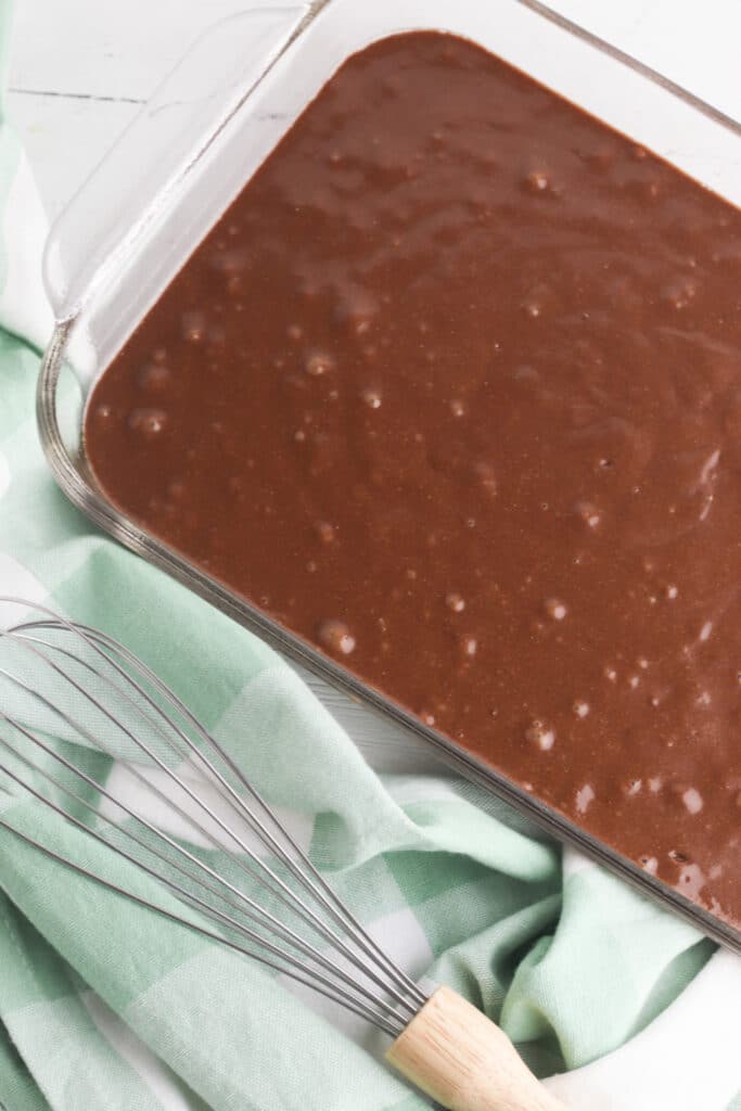 Cake batter in glass baking dish