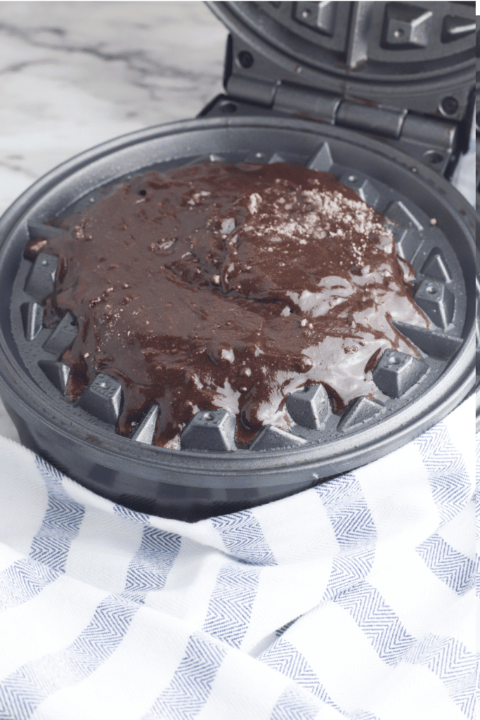 making brownie waffles in waffle icon
