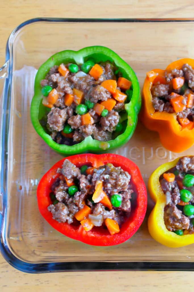 stuffed peppers in glass baking dish