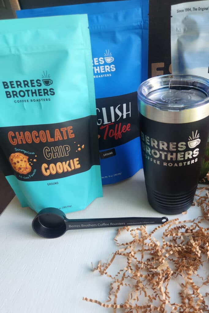 Berres Brothers Coffee, Pictured multiple bags of coffee and Berrer Brother travel mug