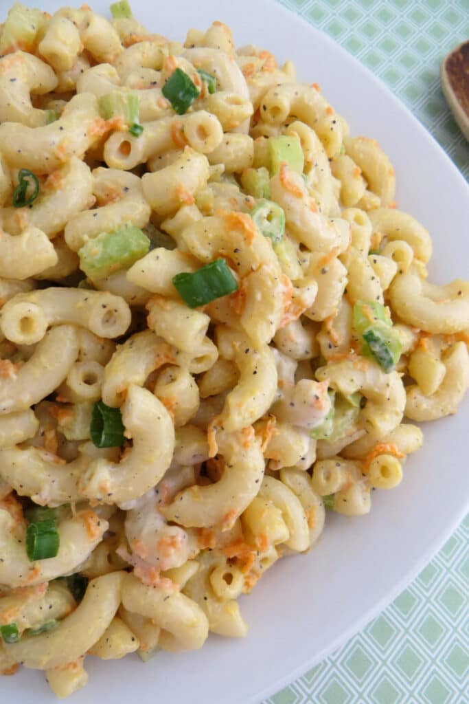 hawaiian pasta salad close up picture on white serving plate