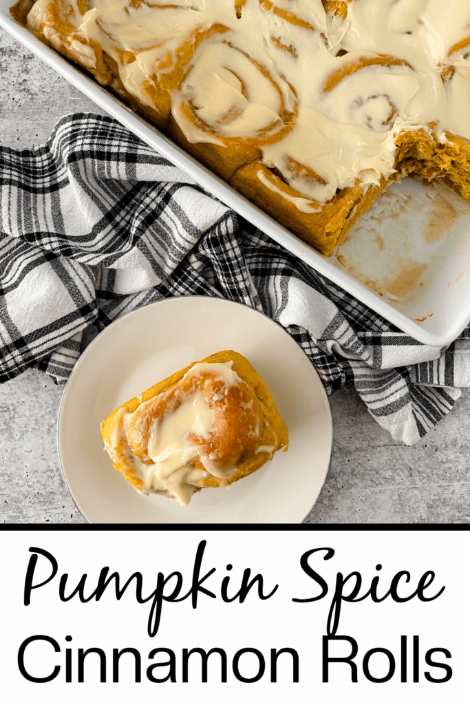 homemade pumpkin spice cinnamon rolls with checker board cloth