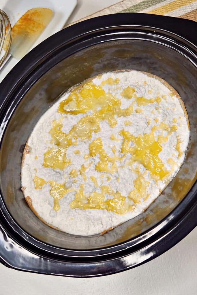 Adding butter and cake mix to crock pot