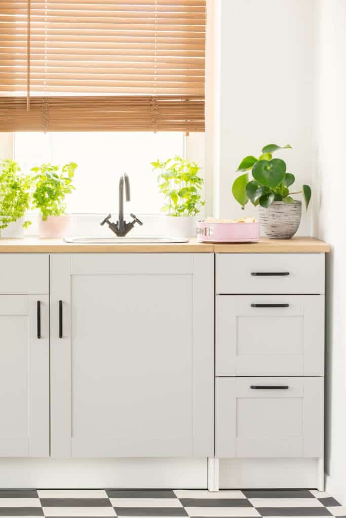 adding kitchen hardware to make kitchen l look more updated