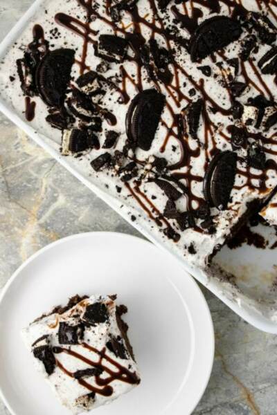 cropped Oreo Poke cake in baking dish 1