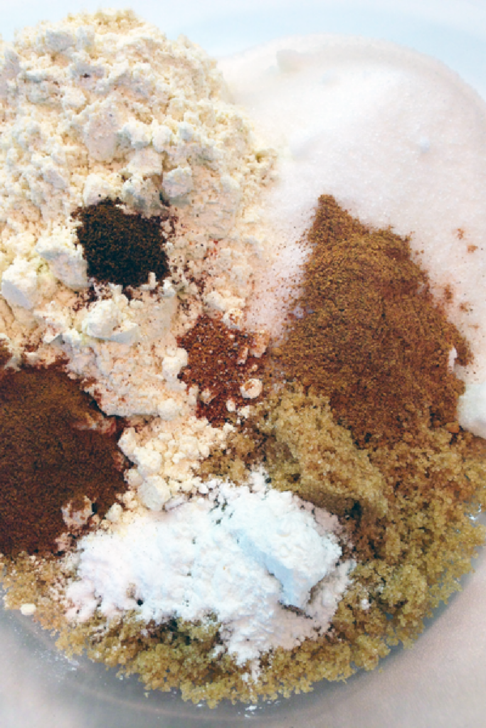 mixing dry ingredients together for pumpkin spiced doughnut
