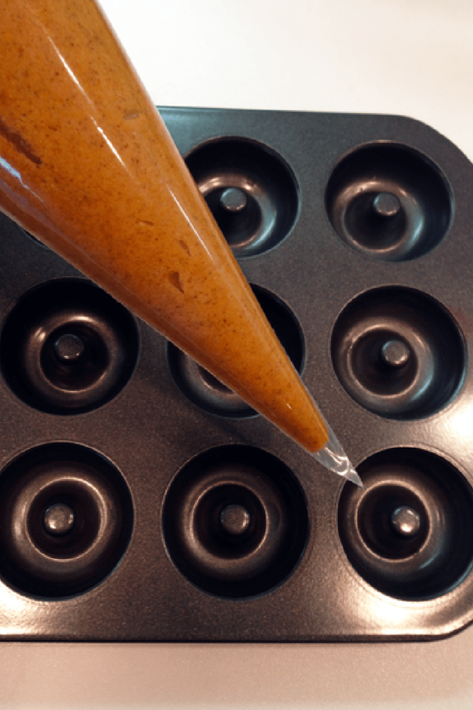 piping dough into pan