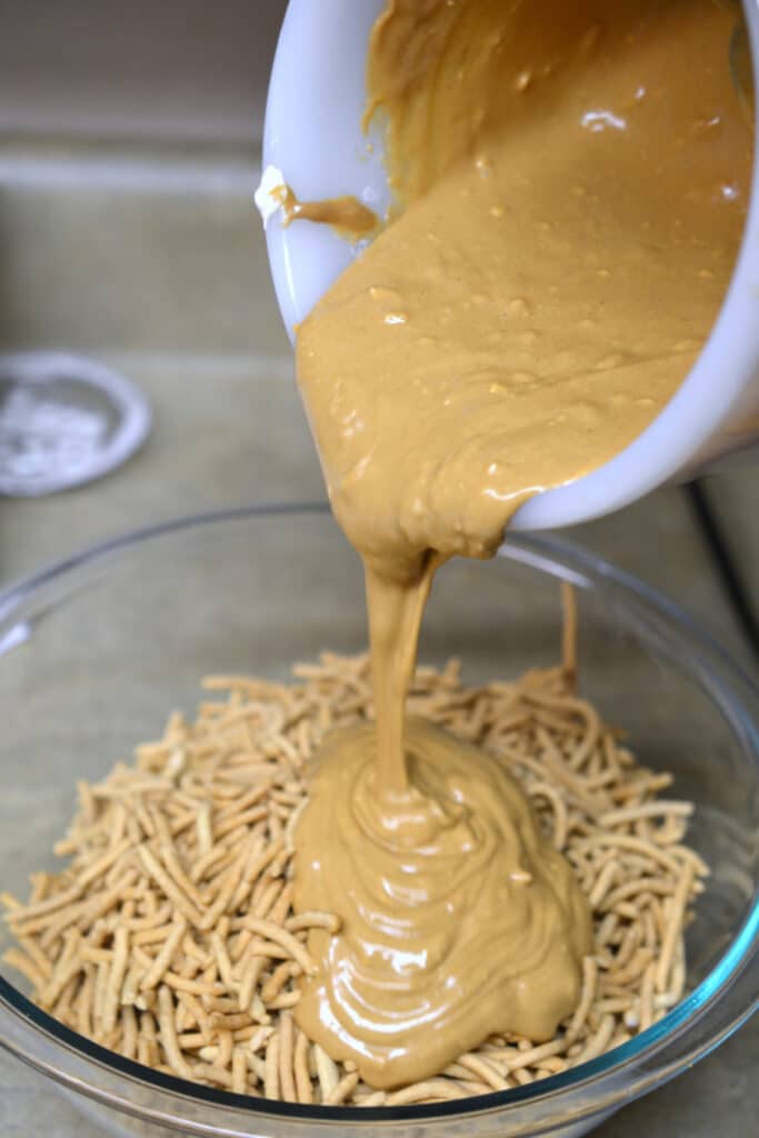 pour melted creamy peanut butter and melted chocolates over crunchy chow mein noodles