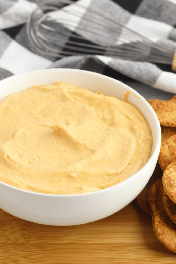 pumpkin cheesecake dip in white bowl