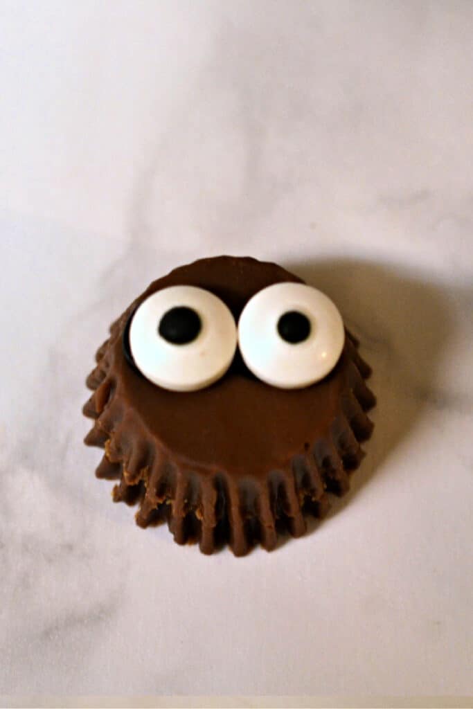 adding googly eyes to reeses cups