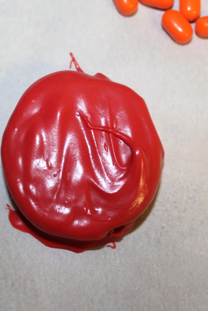 chocolate covered cookie in red