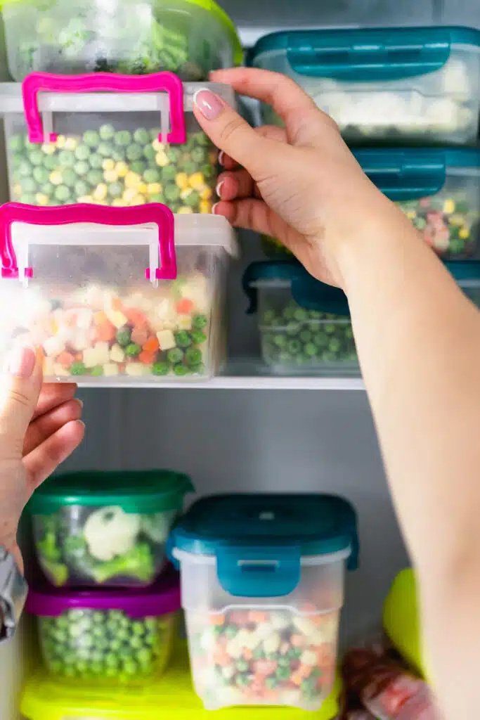 increase freezer space - food organized in the freezer using containers