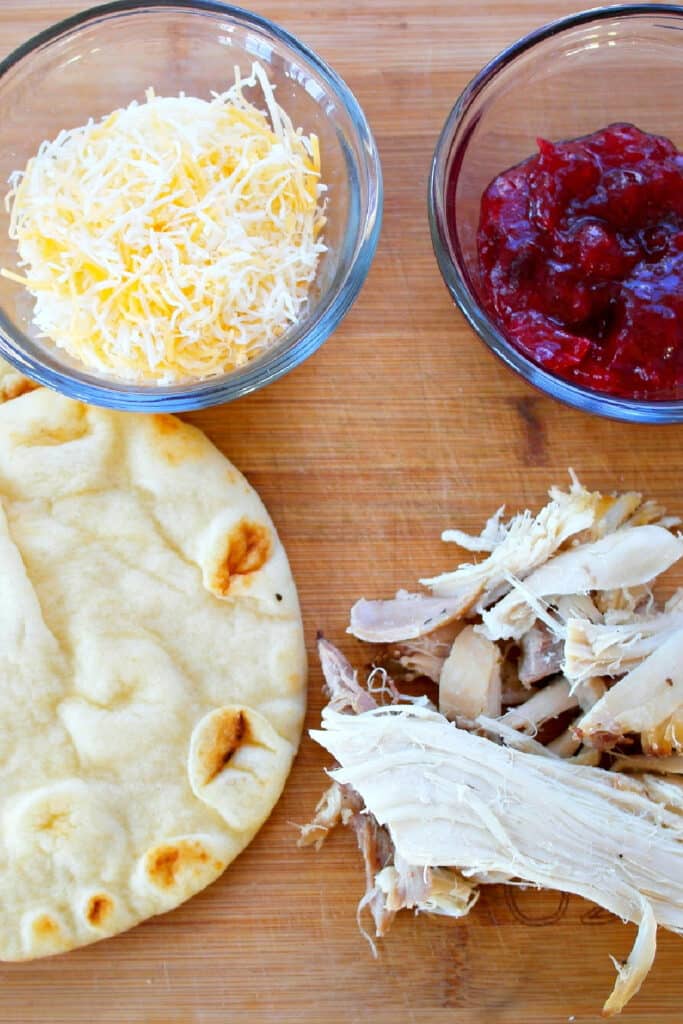 Ingredients needed for turkey cranberry flatbread