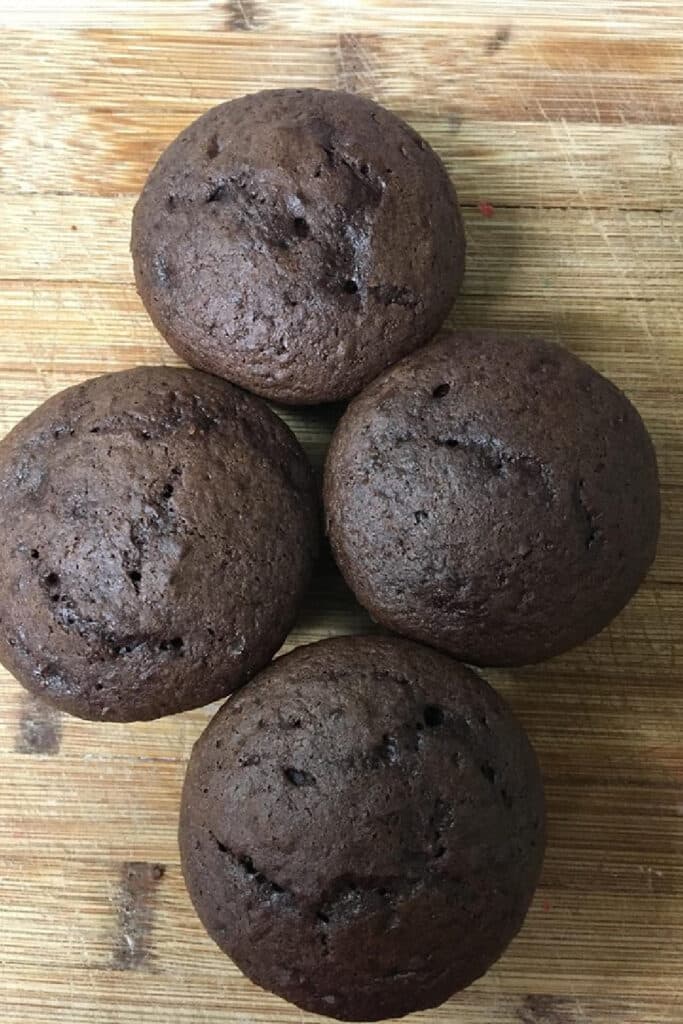 Finished chocolate cupcakes on cutting board