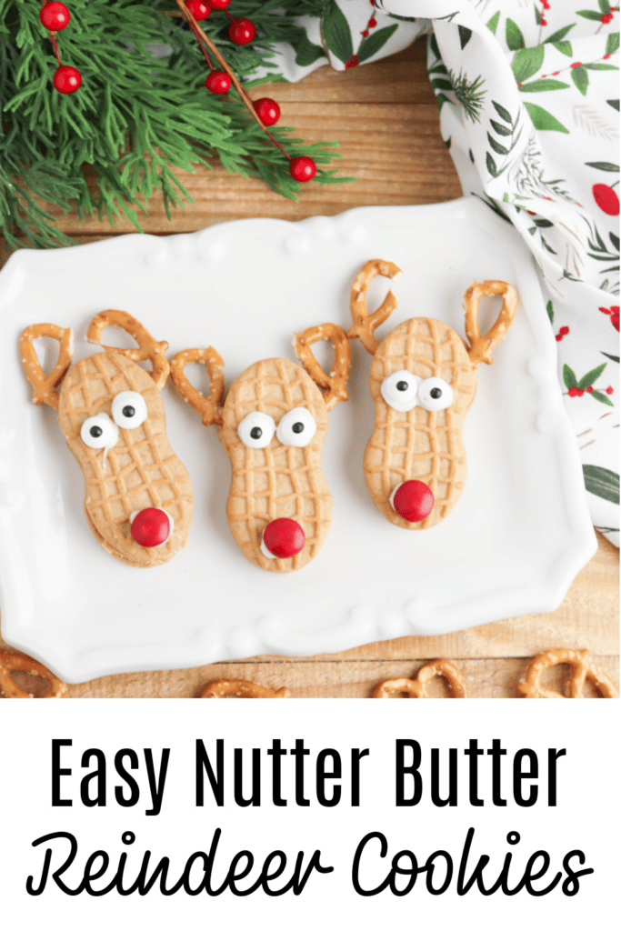 no bake nutter butter reindeer cookies on white festive cookie platter