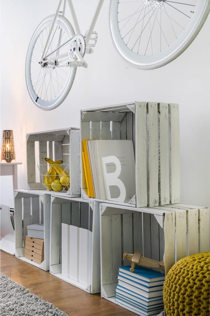 multiple white crates used for organizing in living room