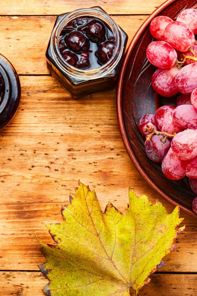 grapes are berries - pictured grapes with grape leaf