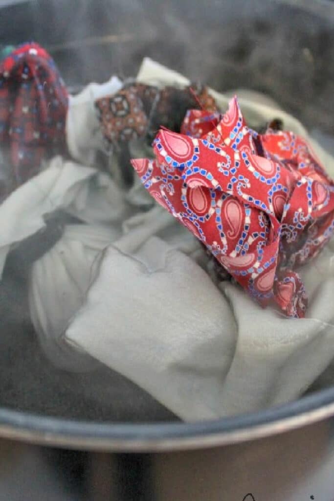 silk egg wrapped ties in boiling water