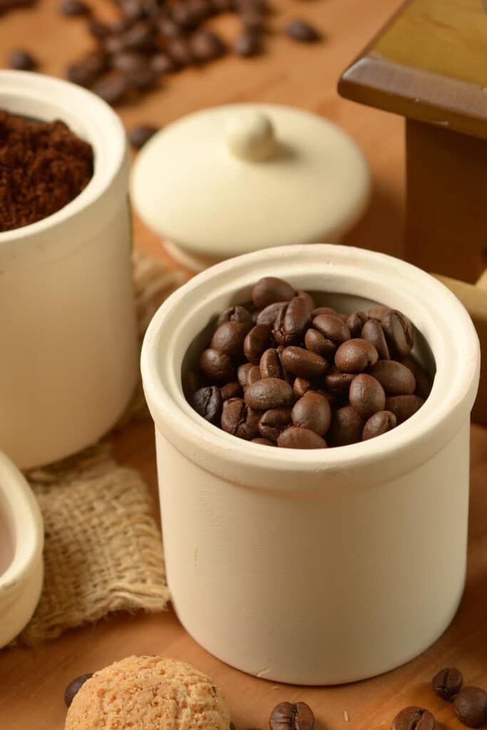 storing coffee in a ceramic container on countertop