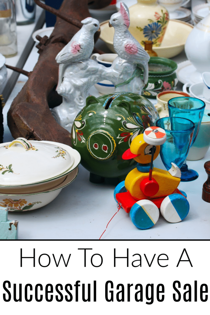 How to have a successful garage sale - pictured items to sell on a fold out table for yard sale