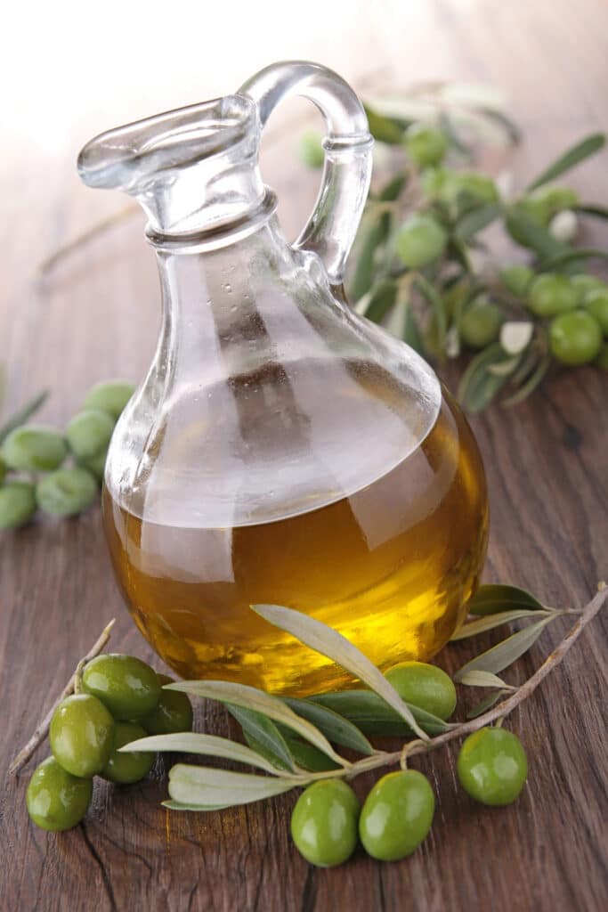 olive oil for cleaning - Olive oil in glass jar