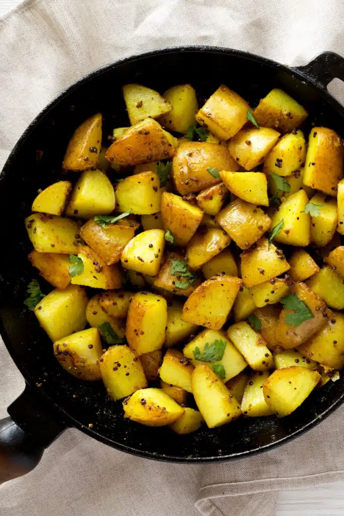 Cast Iron Skillets cook food evenly - cooking potatoes on stove top