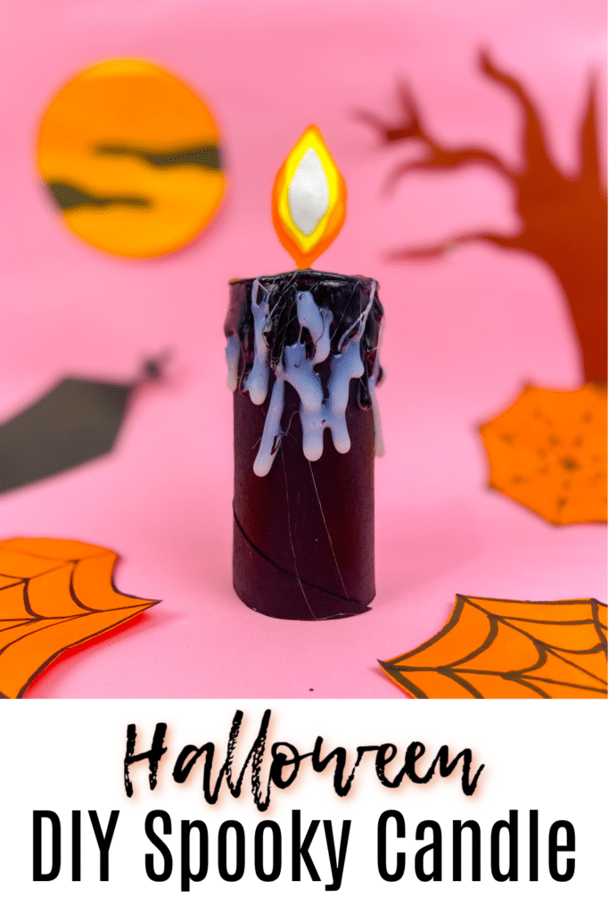 Halloween Homemade Spooky Candle on pink halloween background