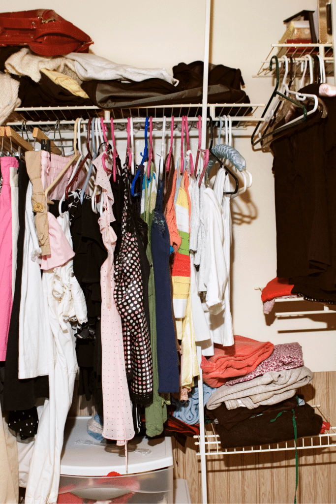 clothing in closet - messy closet