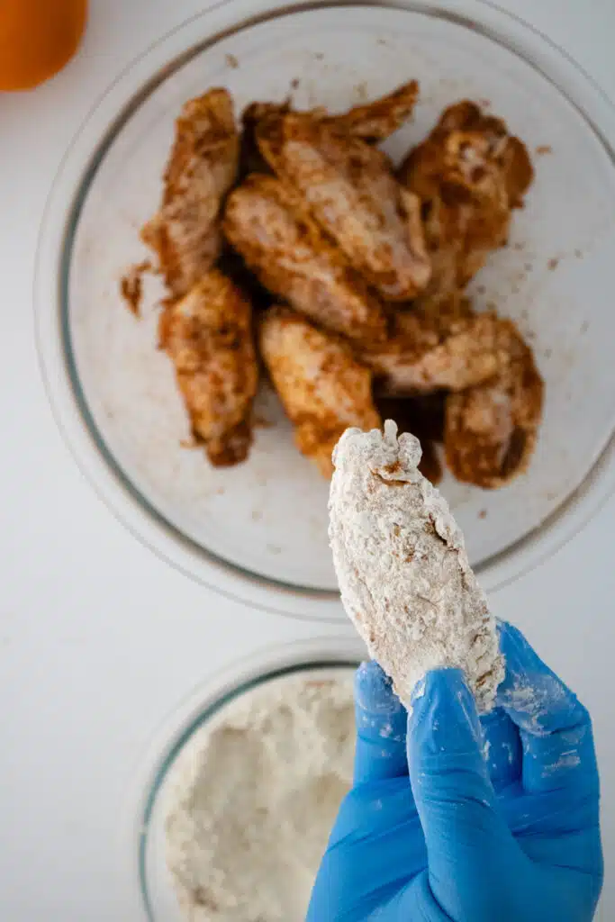 coating chicken in flour