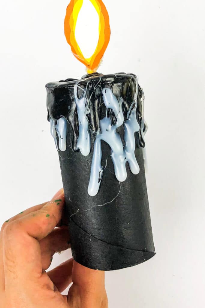 painting candle drips with black paint