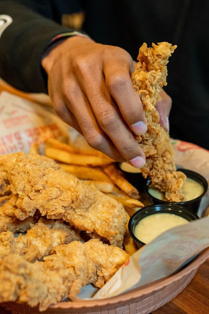 Chilis restaurant free food [ picture of a basket of chicken strips with two sauces