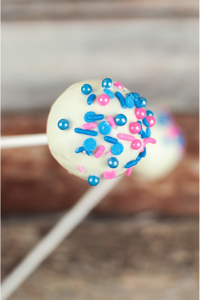 Finished Gender Reveal Cake pop with Blue and Pink Sprinkles