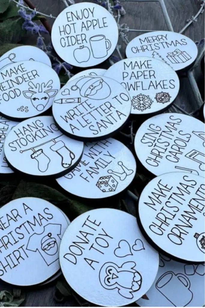 wooden tokens for advent calendar with inscriptions on them. 