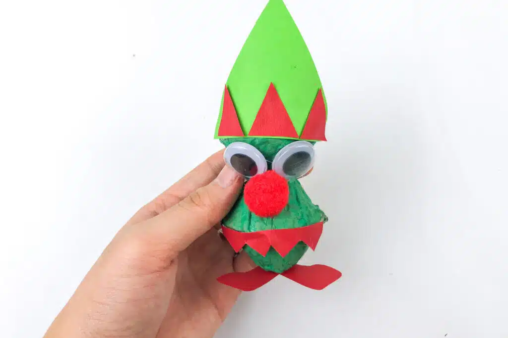 complete egg carton Christmas elf on White background