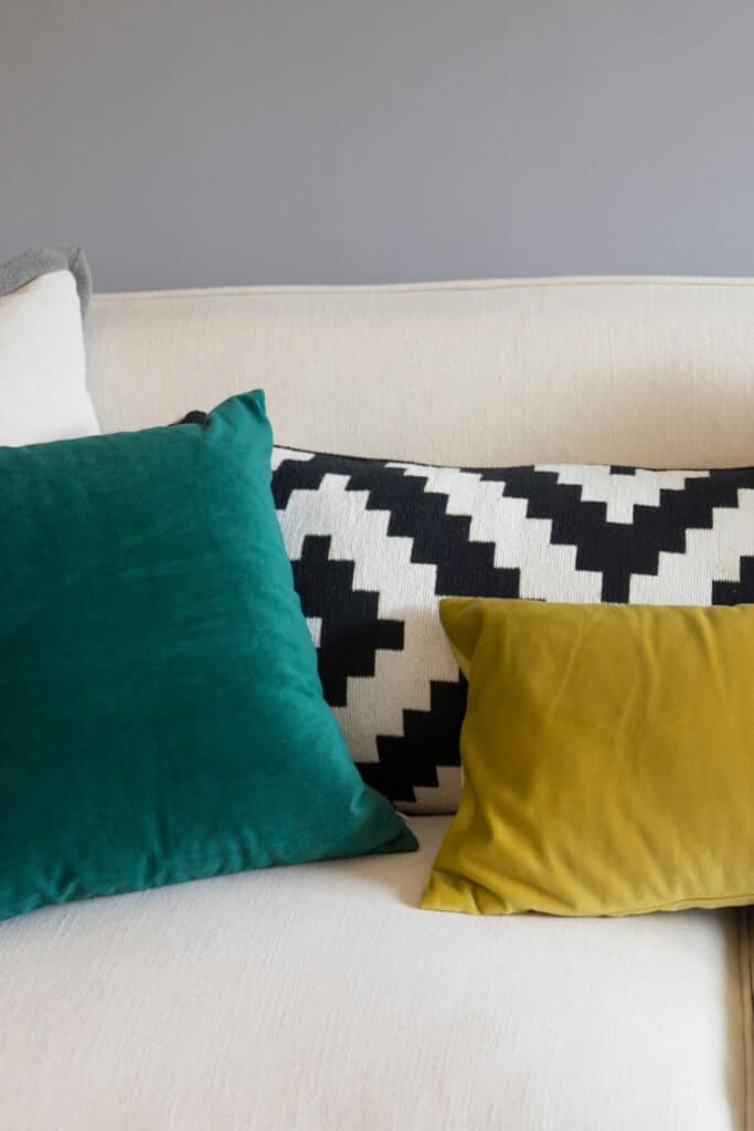 new pillows on couch can create an update look immediately