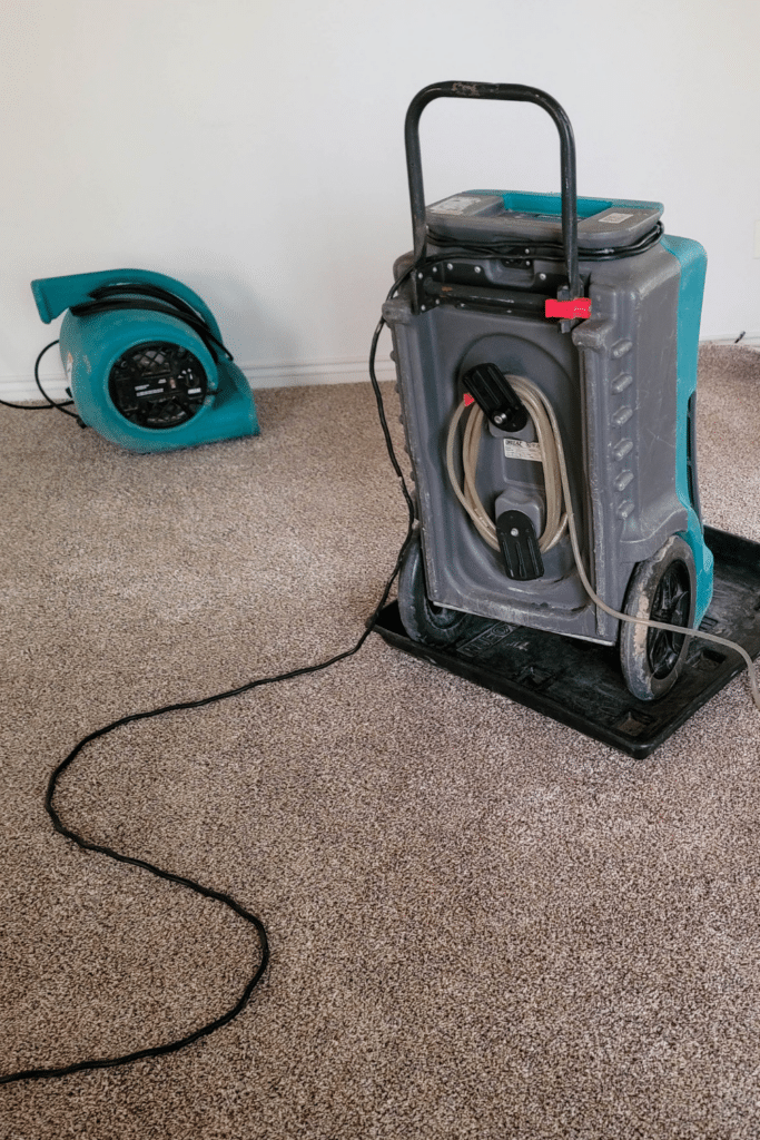 using a fan and a dehumidifier basement floor