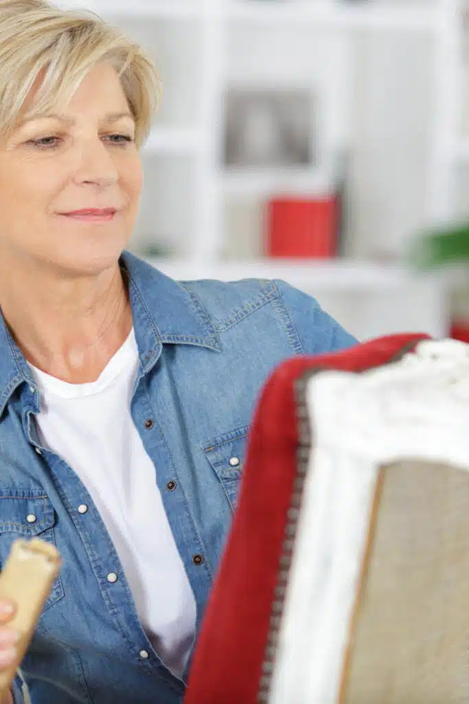 woman fixing a piece of furniture easy diy projects