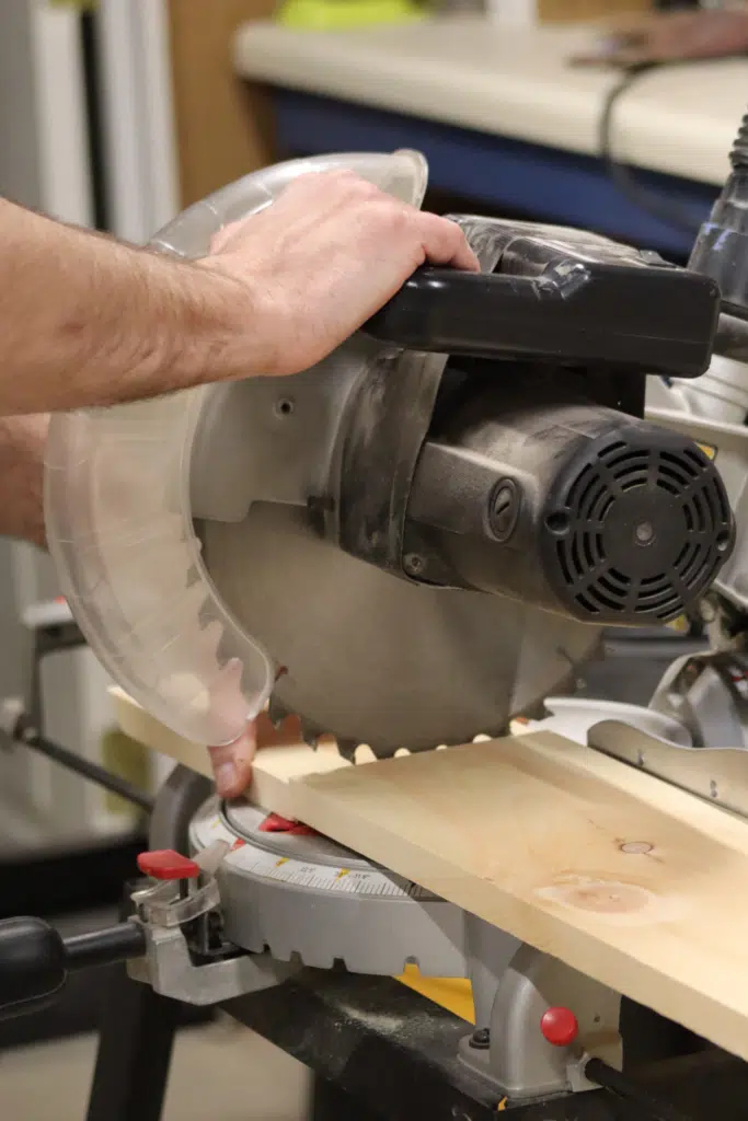 Cutting wood pieces using circular saw for hood range