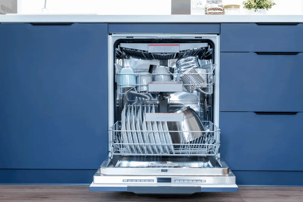Overloaded dishwasher Photo Credit Canva Pro Stock Image