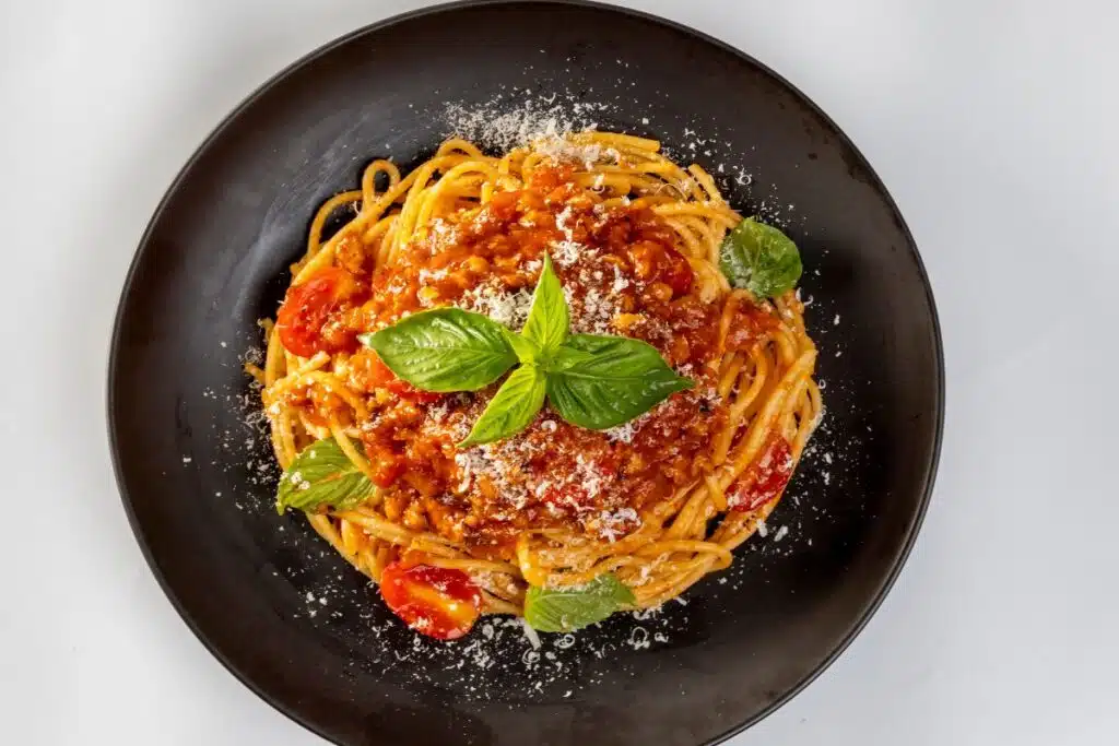 Pasta on Plate with sauce Photo Credit Canva Pro Stock Image