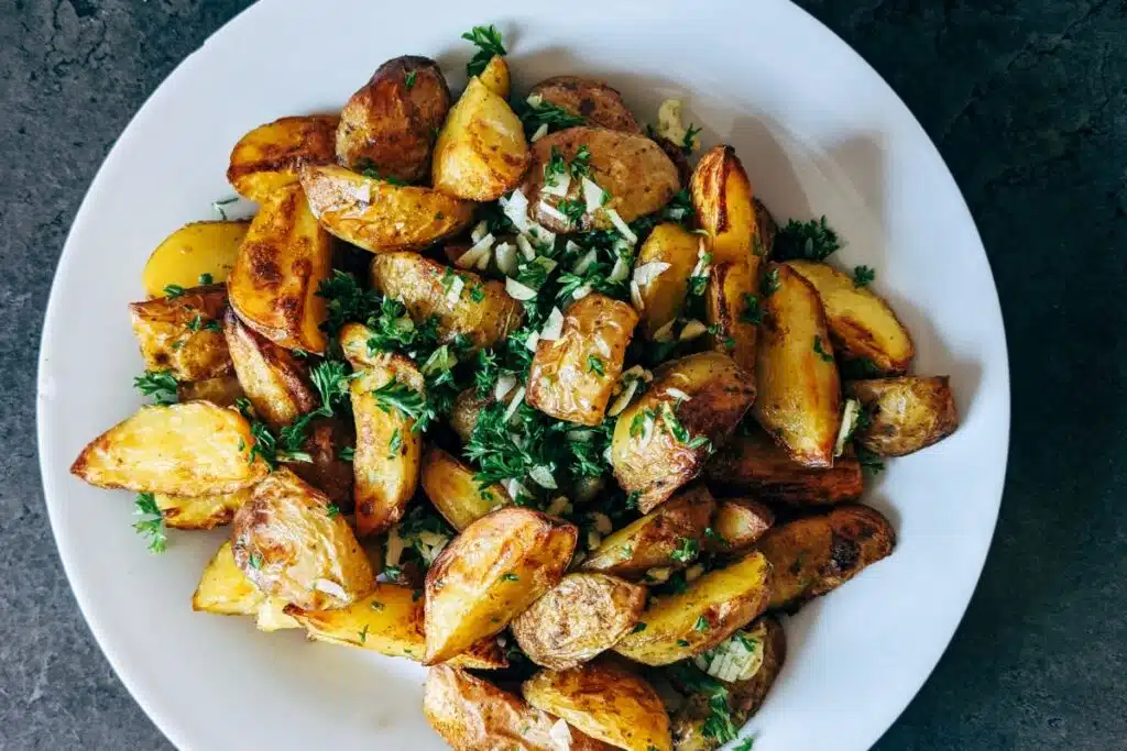 Garlic Parmesan Roasted Potatoes Credit Canva pro Stock Image