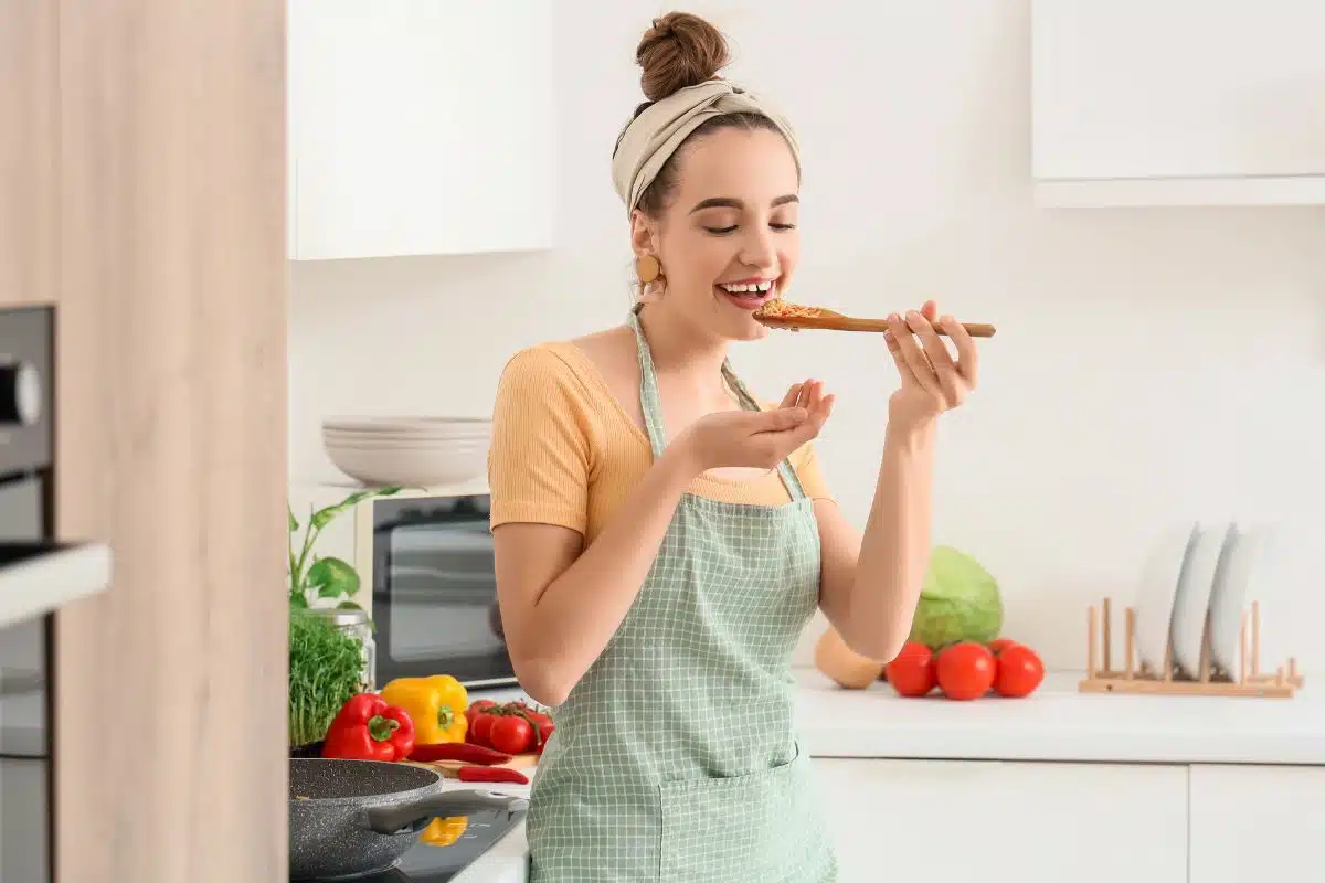 Tasting food cooking Photo Credit Canva Pro Stock Image